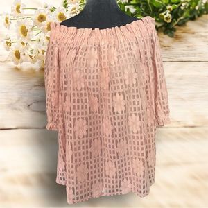 Lace off the shoulder blouse. Puffy lace sleeves. Floral, sheer. Lined body.